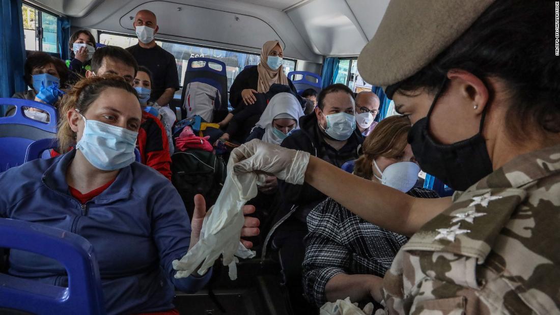 American citizens who were stranded in Syria due to the pandemic arrive at the Lebanese border on their way to the Beirut airport, where they would be leaving for the United States.